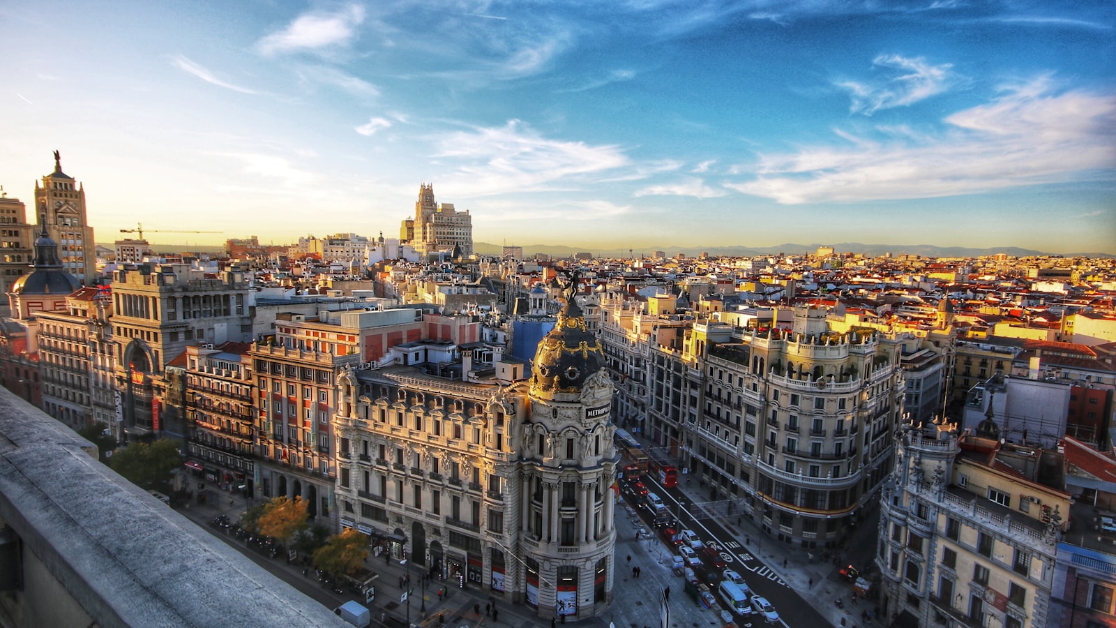 A sun-drenched Adriatic coastline with turquoise water and a historic town on a peninsula — the kind of view FlixBus is opening up to Polish travellers